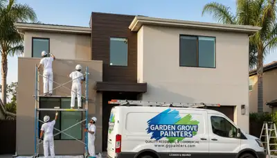 Professional house painters finishing exterior home in Anaheim, CA