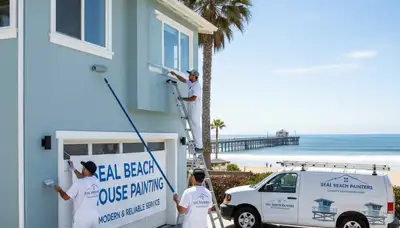 Professional house painters applying exterior paint to a home in Anaheim, CA