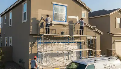 Professional stucco repair on Anaheim, CA home exterior by expert house painters